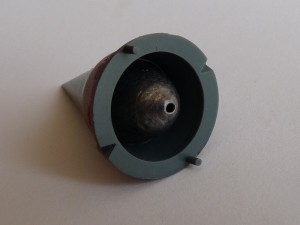 A 15-gram lead fishing weight glued in the nosecone