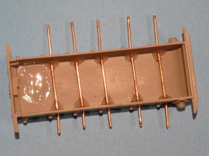 Copper wire to serve as pins for suspension arms